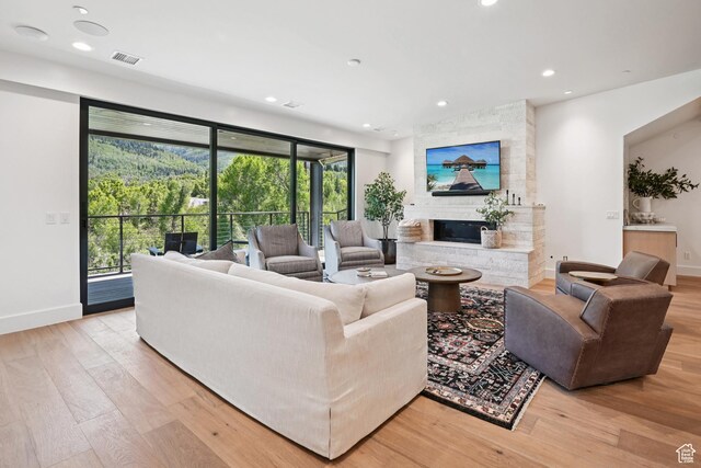 1990 Stone Creek Rd Unit 20, Park City, UT 84098 - living area featuring light wood-style flooring, a fireplace, and recessed lighting
