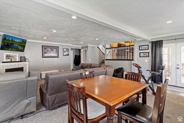 298 W 1775 N, Harrisville, UT 84414 - dining space with recessed lighting, light carpet, crown molding, stairs, and a tile fireplace