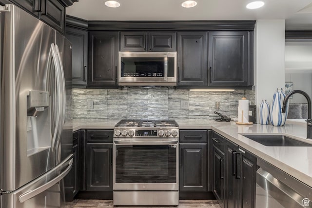 2900 Deer Valley Dr E Unit E211, Deer Valley, UT 84060 - kitchen with stainless steel appliances, a sink, light countertops, recessed lighting, and decorative backsplash