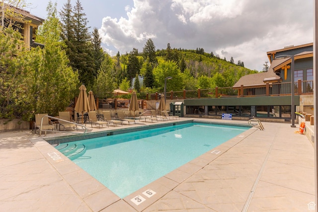2900 Deer Valley Dr E Unit E211, Deer Valley, UT 84060 - community pool with a patio area and a mountain view