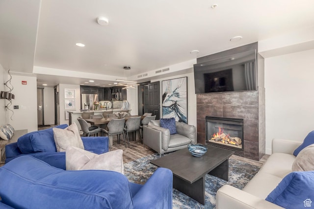 2900 Deer Valley Dr E Unit E211, Deer Valley, UT 84060 - living area with a fireplace, wood finished floors, and recessed lighting