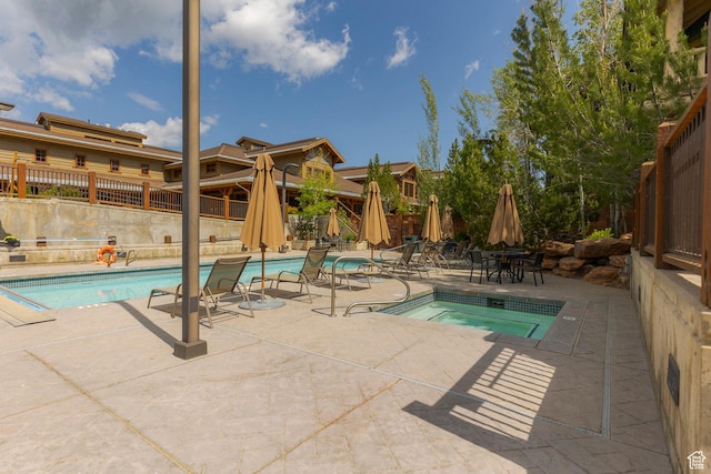 2900 Deer Valley Dr E Unit E211, Deer Valley, UT 84060 - community pool featuring a patio area and a community hot tub