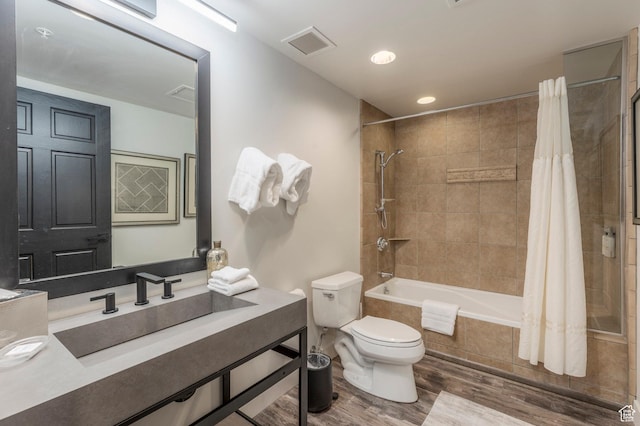 2900 Deer Valley Dr E Unit E211, Deer Valley, UT 84060 - full bath featuring toilet, tiled shower / bath combo, wood finished floors, vanity, and recessed lighting