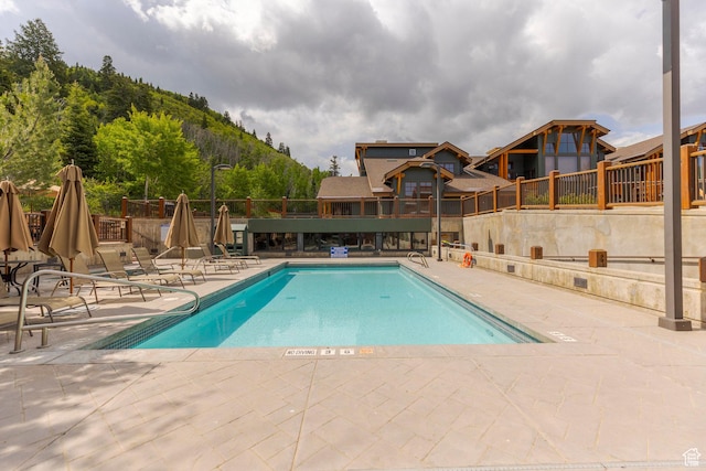 2900 Deer Valley Dr E Unit E211, Deer Valley, UT 84060 - community pool featuring a patio and a mountain view