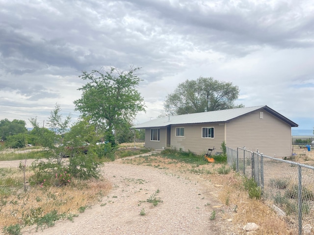 3301 S 1500 E, Vernal, UT 84078 - back of house with metal roof and driveway