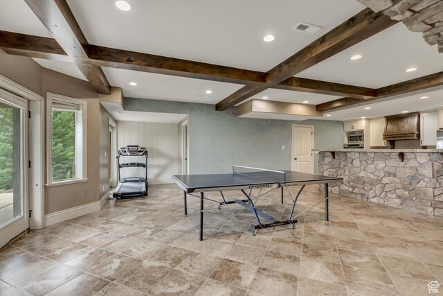 6663 W Normandy Way, Highland, UT 84003 - game room with beamed ceiling, baseboards, recessed lighting, and light stone finish floors