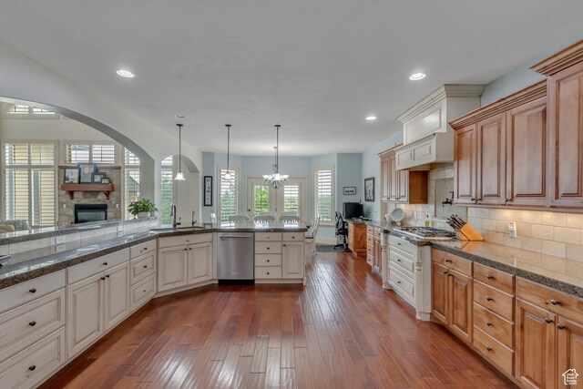 6663 W Normandy Way, Highland, UT 84003 - kitchen featuring stainless steel appliances, a sink, a chandelier, dark wood-style flooring, and recessed lighting