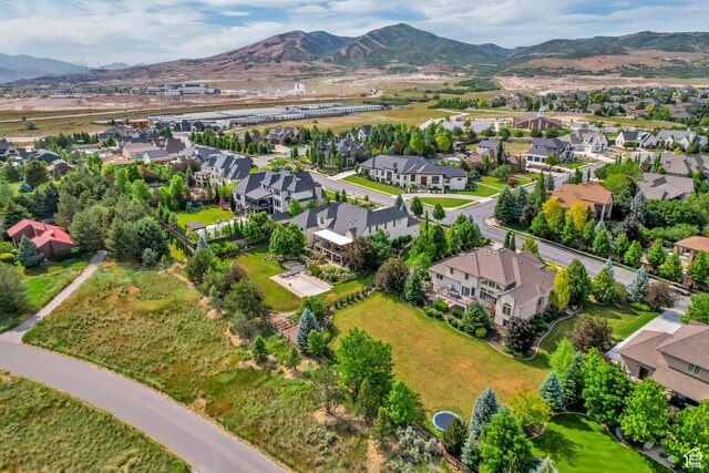 6663 W Normandy Way, Highland, UT 84003 - aerial view of residential area with a mountain backdrop