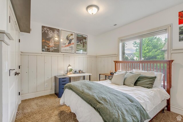 6663 W Normandy Way, Highland, UT 84003 - bedroom with wainscoting and light colored carpet