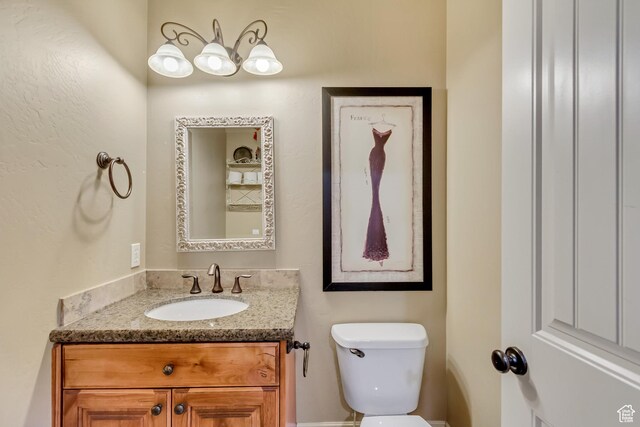 6663 W Normandy Way, Highland, UT 84003 - bathroom featuring vanity and toilet
