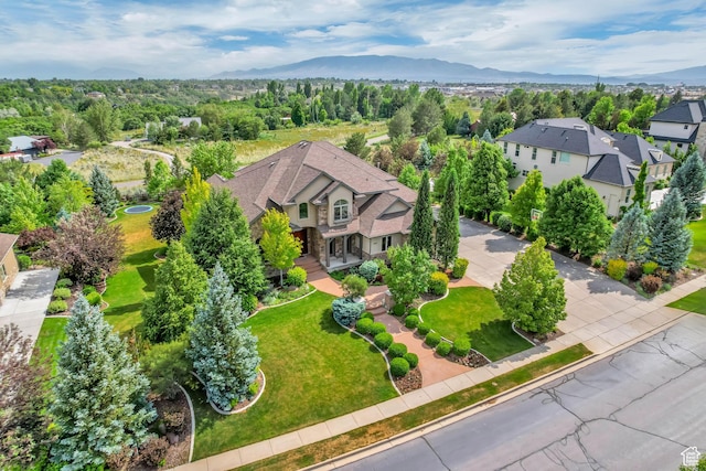 6663 W Normandy Way, Highland, UT 84003 - aerial perspective of suburban area featuring a mountainous background