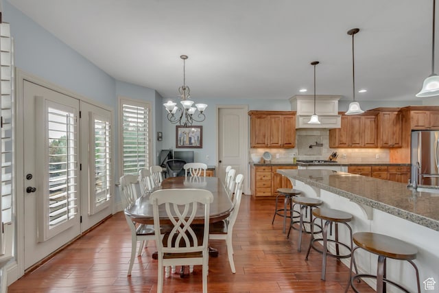 6663 W Normandy Way, Highland, UT 84003 - dining room featuring a chandelier, wood finished floors, and recessed lighting