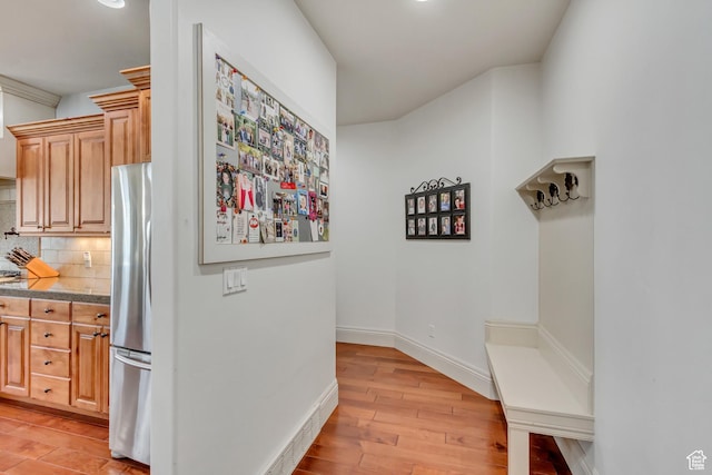 6663 W Normandy Way, Highland, UT 84003 - mudroom featuring light wood-type flooring and baseboards