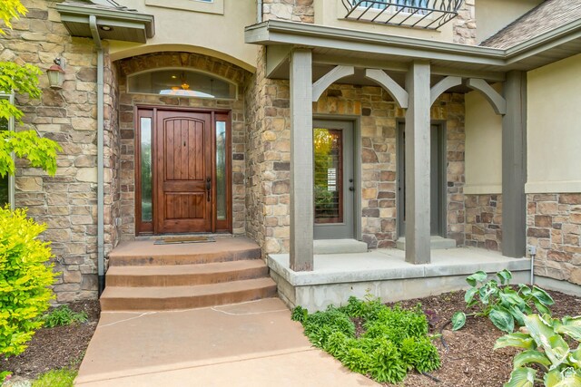 6663 W Normandy Way, Highland, UT 84003 - entrance to property with stone siding and stucco siding