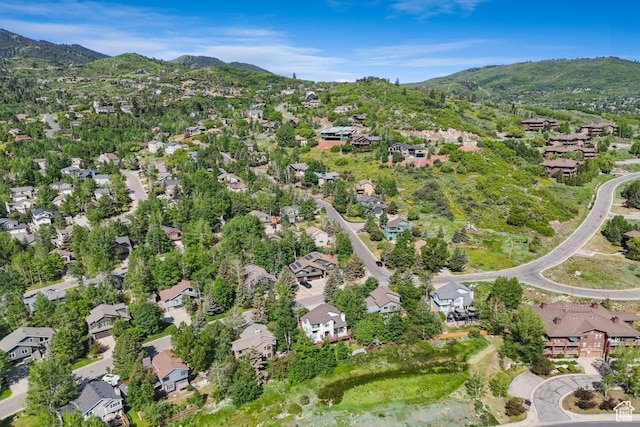 8086 N Meadowview Dr, Snyderville, UT 84098 - aerial view of property and surrounding area with nearby suburban area and mountains