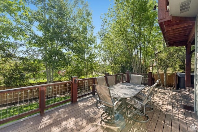8086 N Meadowview Dr, Snyderville, UT 84098 - deck with outdoor dining space and view of scattered trees