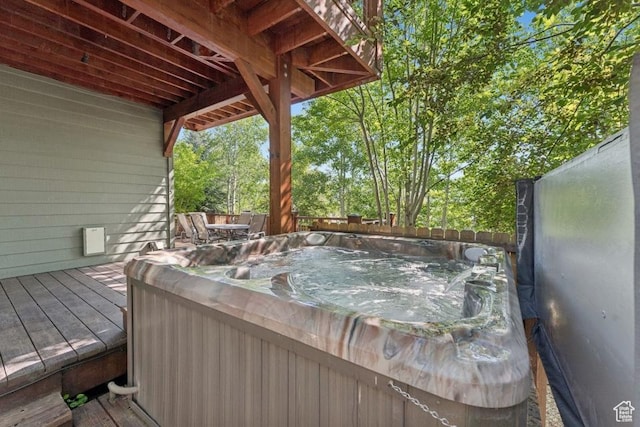 8086 N Meadowview Dr, Snyderville, UT 84098 - wooden deck with a hot tub and a fenced backyard