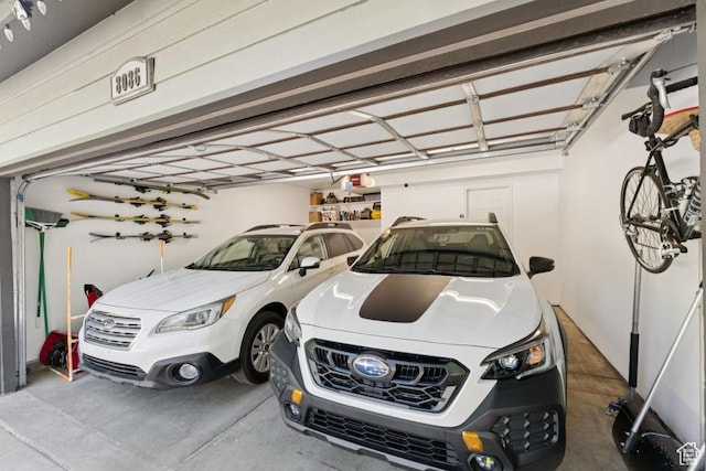 8086 N Meadowview Dr, Snyderville, UT 84098 - garage featuring a garage door opener