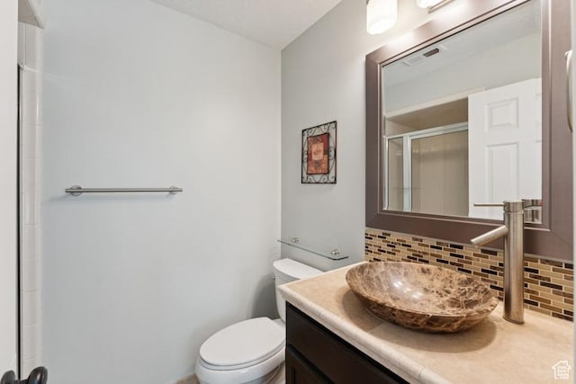 8086 N Meadowview Dr, Snyderville, UT 84098 - full bath with backsplash, vanity, toilet, and an enclosed shower