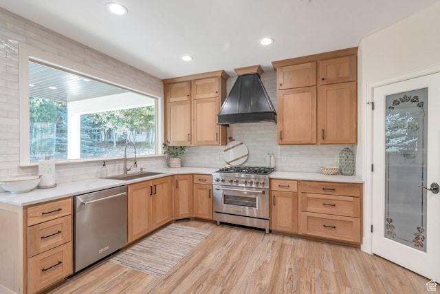 1110 S Woodland Hills Dr, Woodland Hills, UT 84653 - kitchen with appliances with stainless steel finishes, custom range hood, a sink, light brown cabinets, and tasteful backsplash
