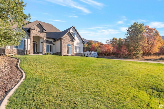1110 S Woodland Hills Dr, Woodland Hills, UT 84653 - view of home's exterior with stone siding and a yard