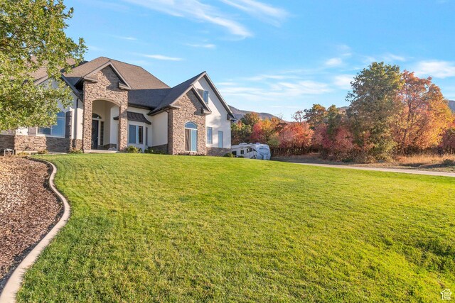 1110 S Woodland Hills Dr, Woodland Hills, UT 84653 - view of home's exterior with stone siding and a yard