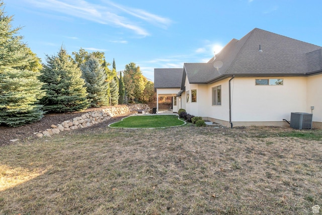 1110 S Woodland Hills Dr, Woodland Hills, UT 84653 - view of grassy yard with central AC unit and a patio