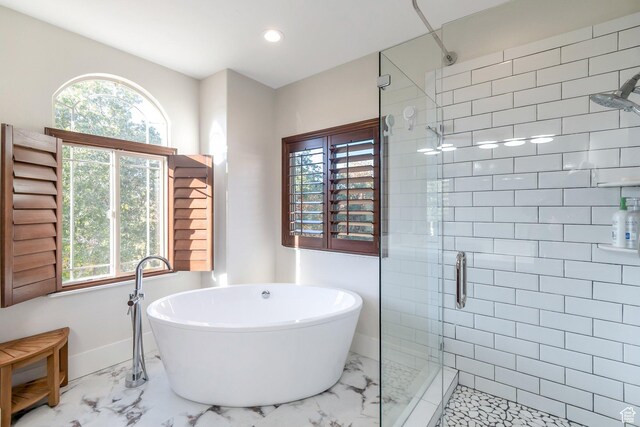 1110 S Woodland Hills Dr, Woodland Hills, UT 84653 - full bath featuring marble finish flooring, a stall shower, a freestanding bath, recessed lighting, and baseboards
