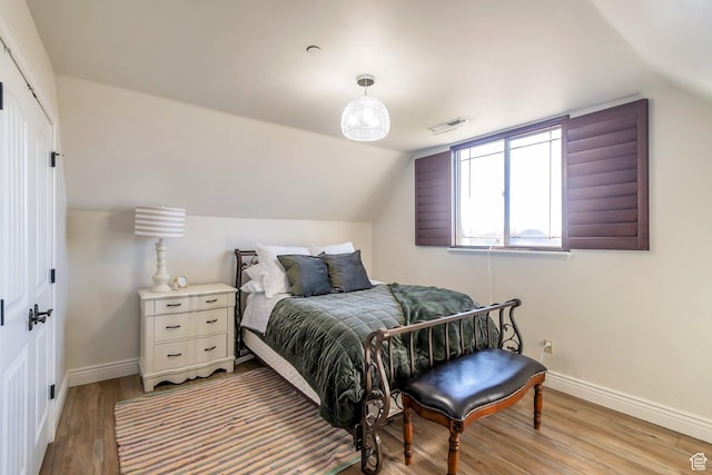 1110 S Woodland Hills Dr, Woodland Hills, UT 84653 - bedroom featuring light wood-type flooring, baseboards, lofted ceiling, and a closet