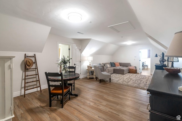 1110 S Woodland Hills Dr, Woodland Hills, UT 84653 - dining area featuring vaulted ceiling, light wood-type flooring, attic access, and baseboards