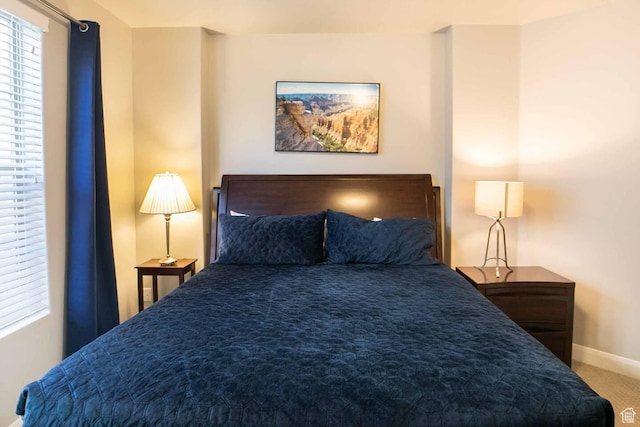1914 E Fiesta Ln, Washington, UT 84780 - carpeted bedroom featuring baseboards