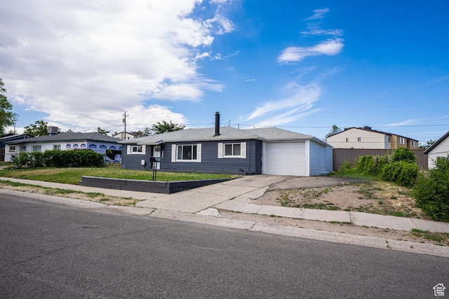 4820 S 4900 W, Kearns, UT 84118 - single story home featuring concrete driveway, a garage, and a front lawn