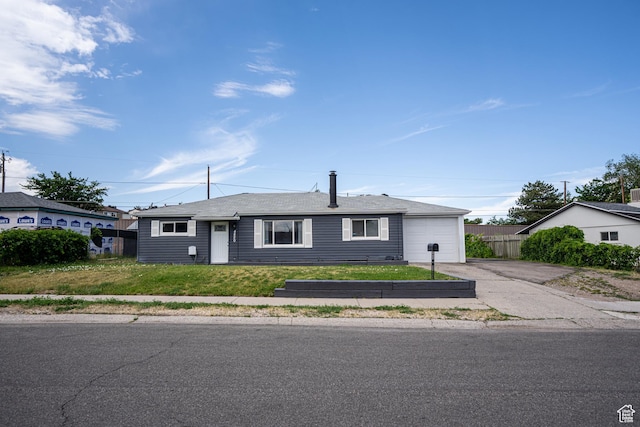 4820 S 4900 W, Kearns, UT 84118 - ranch-style house featuring driveway and an attached garage