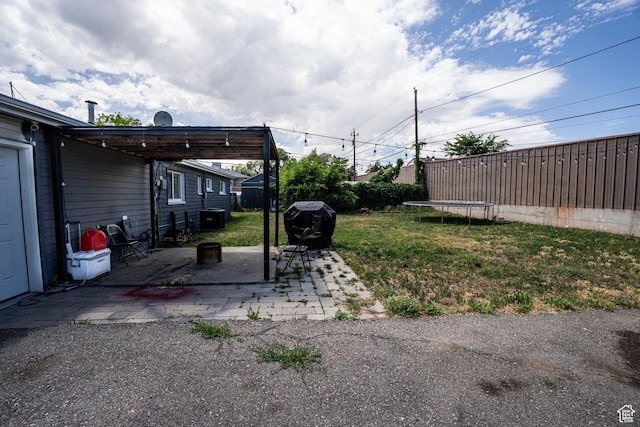 4820 S 4900 W, Kearns, UT 84118 - view of yard featuring a patio area and central AC unit
