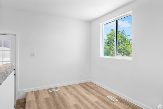 3717 W 8620 S, West Jordan, UT 84088 - unfurnished room featuring baseboards and light wood-style floors