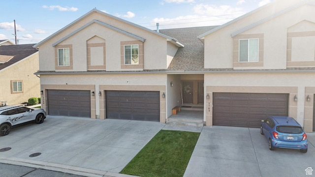 1146 S 2880 E, Spanish Fork, UT 84660 - view of front of property with an attached garage, driveway, and stucco siding