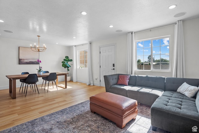1146 S 2880 E, Spanish Fork, UT 84660 - living area with a chandelier, light wood-style flooring, recessed lighting, and a textured ceiling