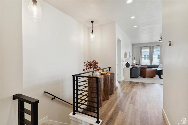5936 N Angels Landing Dr, Mountain Green, UT 84050 - corridor featuring an upstairs landing, wood finished floors, baseboards, and recessed lighting