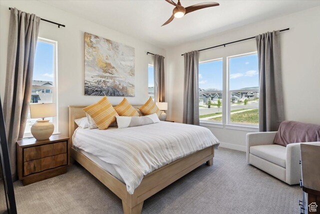 5936 N Angels Landing Dr, Mountain Green, UT 84050 - carpeted bedroom featuring a ceiling fan and baseboards