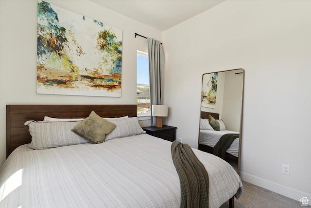 5936 N Angels Landing Dr, Mountain Green, UT 84050 - carpeted bedroom featuring baseboards