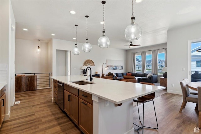 5936 N Angels Landing Dr, Mountain Green, UT 84050 - kitchen featuring a sink, stainless steel dishwasher, light countertops, and recessed lighting