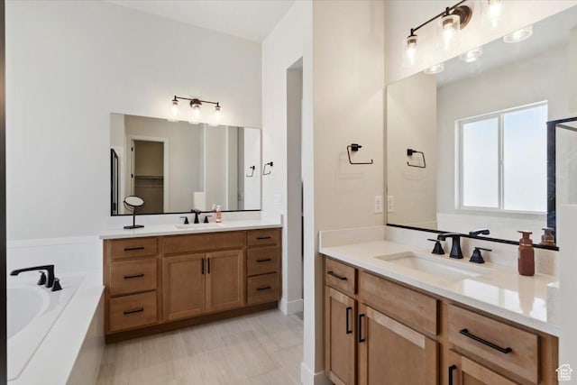 5936 N Angels Landing Dr, Mountain Green, UT 84050 - bathroom featuring two vanities and a garden tub