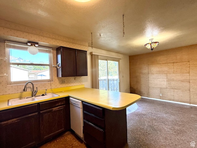 8731 S Gladiator Way, Sandy, UT 84094 - kitchen featuring dishwashing machine, wallpapered walls, a sink, a peninsula, and dark brown cabinets