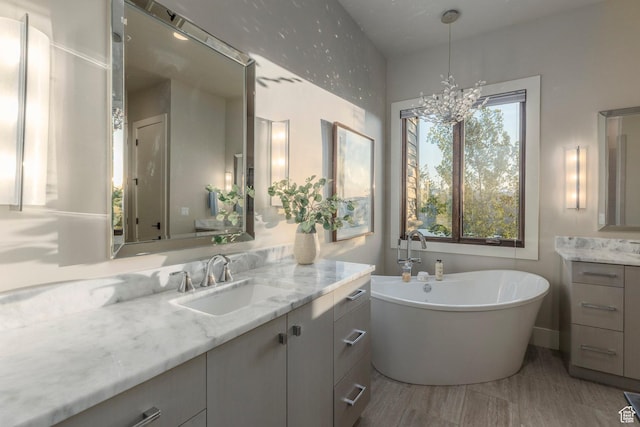 1136 E Black Hawk Way, Hideout, UT 84036 - full bath featuring vanity, a soaking tub, and a chandelier