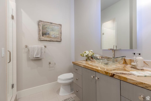 1136 E Black Hawk Way, Hideout, UT 84036 - bathroom with vanity, toilet, a stall shower, and tile patterned floors