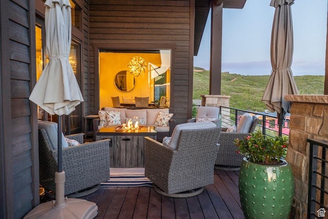 1136 E Black Hawk Way, Hideout, UT 84036 - deck with an outdoor living space with a fire pit