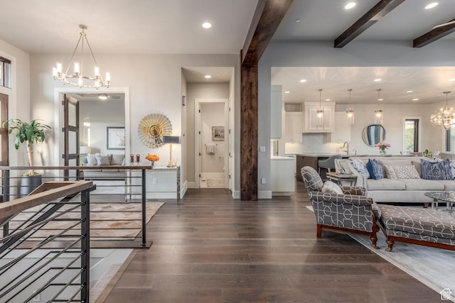 1136 E Black Hawk Way, Hideout, UT 84036 - living room with a chandelier, dark wood finished floors, recessed lighting, beam ceiling, and baseboards
