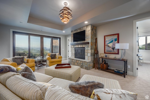 1136 E Black Hawk Way, Hideout, UT 84036 - carpeted living area with recessed lighting, a fireplace, baseboards, and a tray ceiling