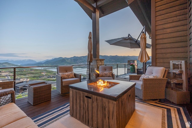 1136 E Black Hawk Way, Hideout, UT 84036 - view of patio featuring an outdoor fire pit and a mountain view