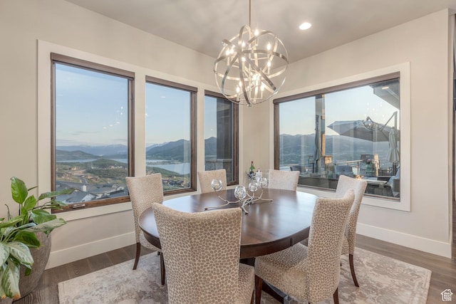 1136 E Black Hawk Way, Hideout, UT 84036 - dining room featuring baseboards, wood finished floors, a chandelier, recessed lighting, and a mountain view